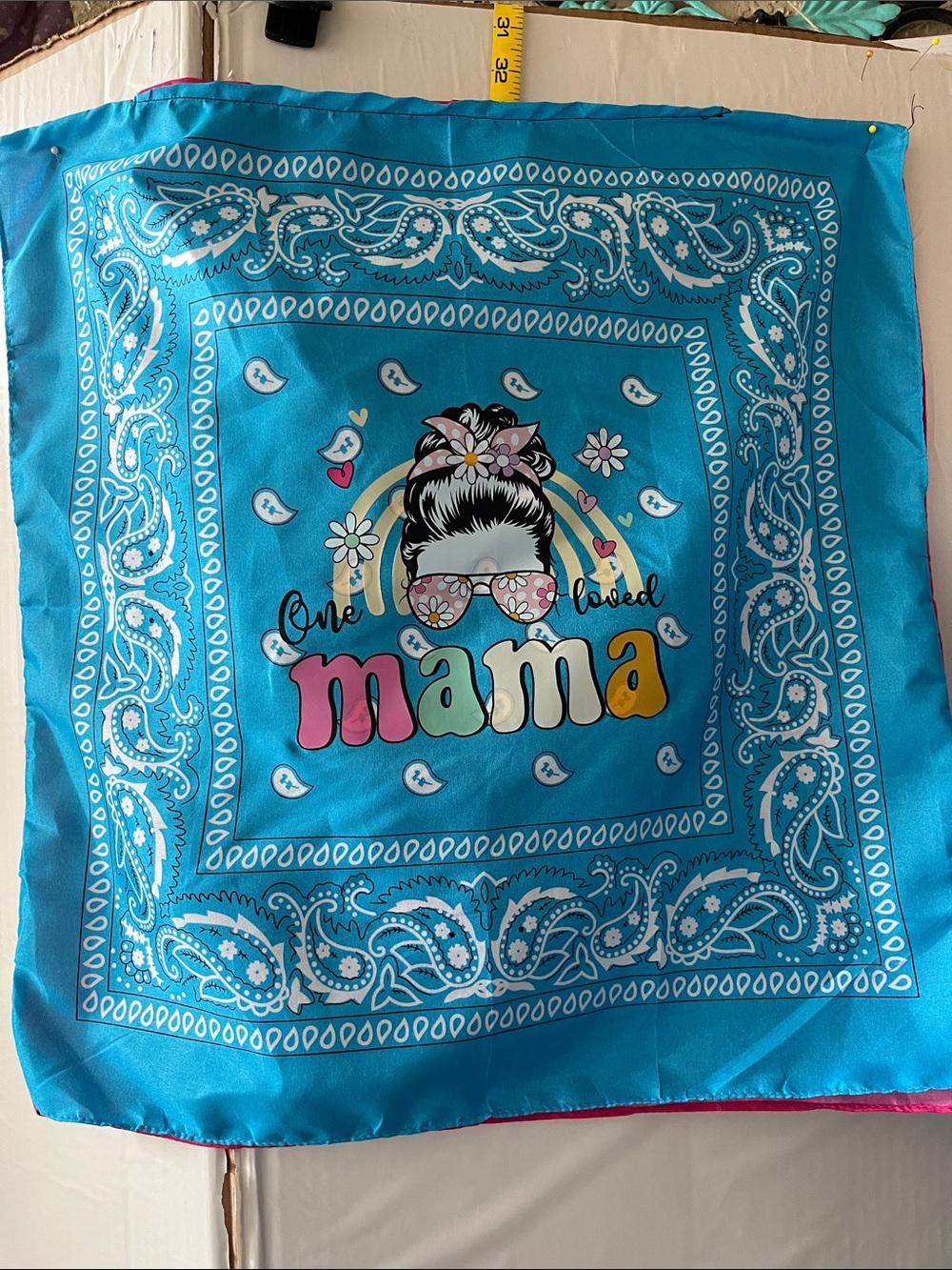 Turquoise "One Blessed Mama" Bandana top with pink and teal colors.